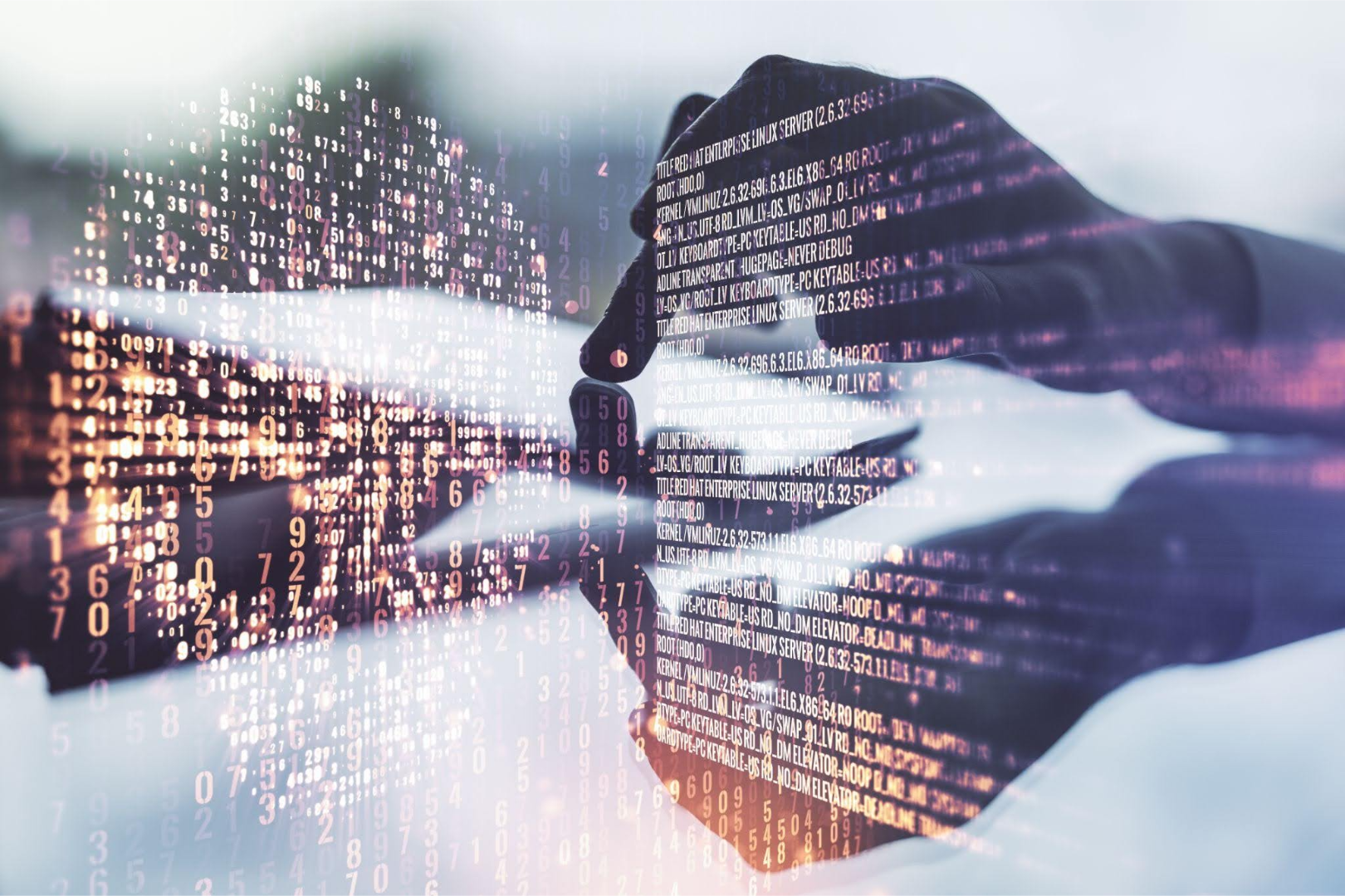 Hands typing on a laptop with digital code overlay, representing data sovereignty, cybersecurity, and data protection.